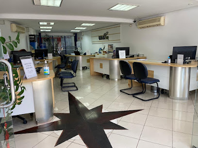 Numatur Viagens e Turismo e Numatur Corretora de Câmbio